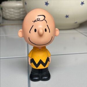 Charlie Brown Figurine with Yellow and Black Outfit